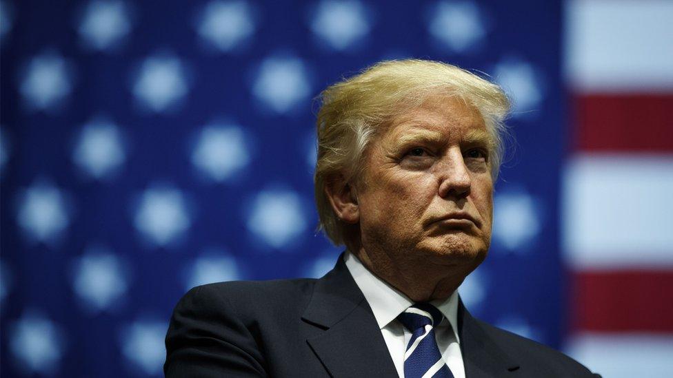 President-elect Donald Trump looks on during at the DeltaPlex Arena, December 9, 2016 in Grand Rapids, Michigan.