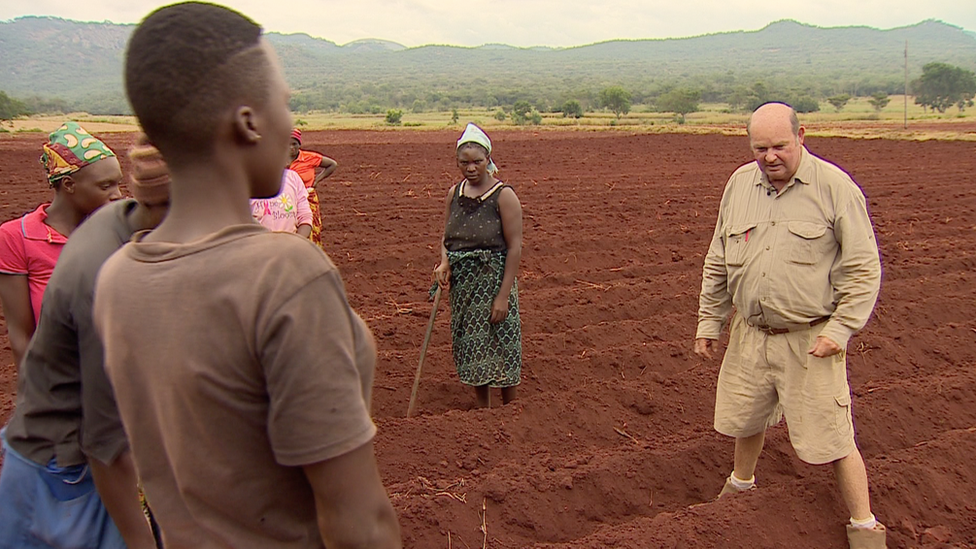 Dave Wakefield and workers at his farm