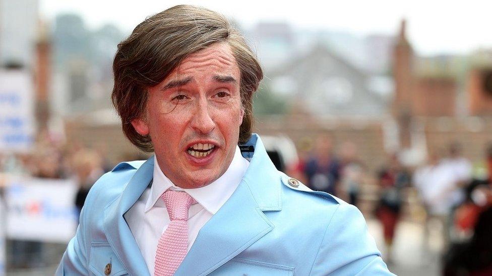 Steve Coogan in character as Alan Partridge in a light blue suit