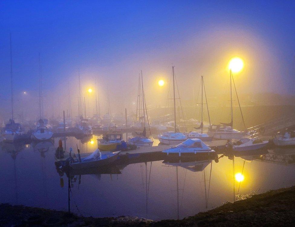 Boats in mist