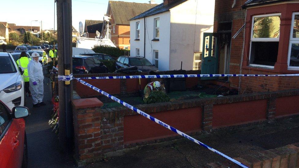 Police tape around the scene of the fire