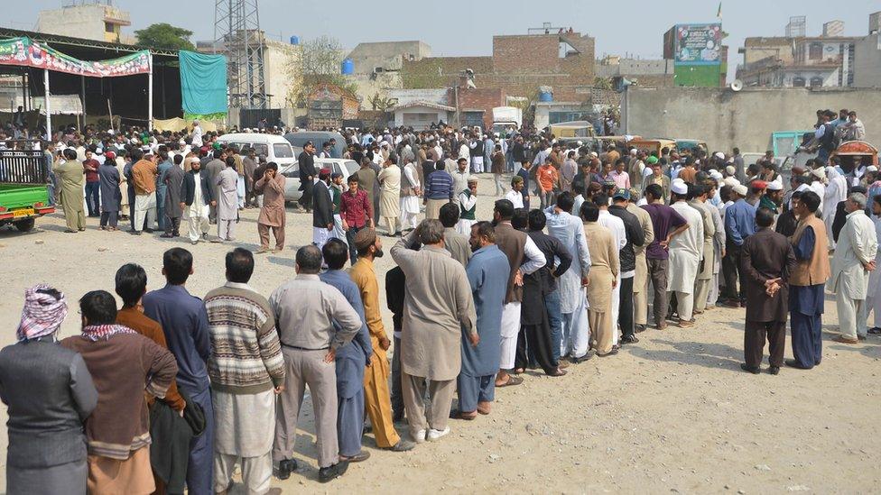 Pakistani supporters gather as the body of convicted murderer Mumtaz Qadri is brought to his house following his execution in Rawalpindi on February 29, 2016.