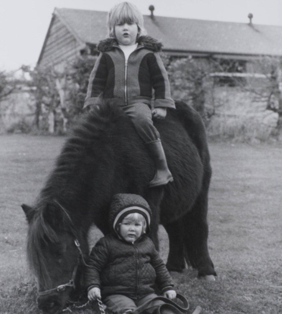 Clare on her pony Valkyrie with her brother Andrew