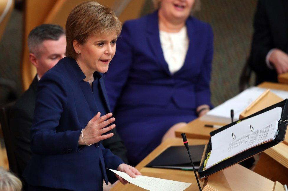 Scotland's First Minister Nicola Sturgeon during First Minister's Questions at the Scottish Parliament in Edinburgh.