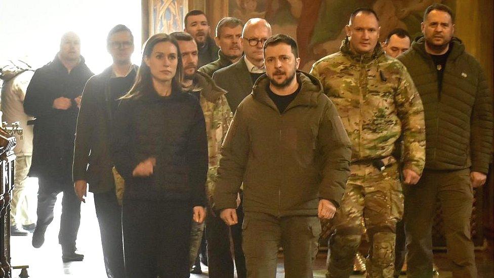 Finland's Prime Minister Sanna Marin (C-L) Ukrainian President Volodymyr Zelensky (C-R) attend the funeral of Ukrainian serviceman Dmytro Kotsiubailo, at the Saint Michael's Golden-Domed Monastery in Kyiv (Kiev), Ukraine, 10 March 2023, amid the Russian invasion