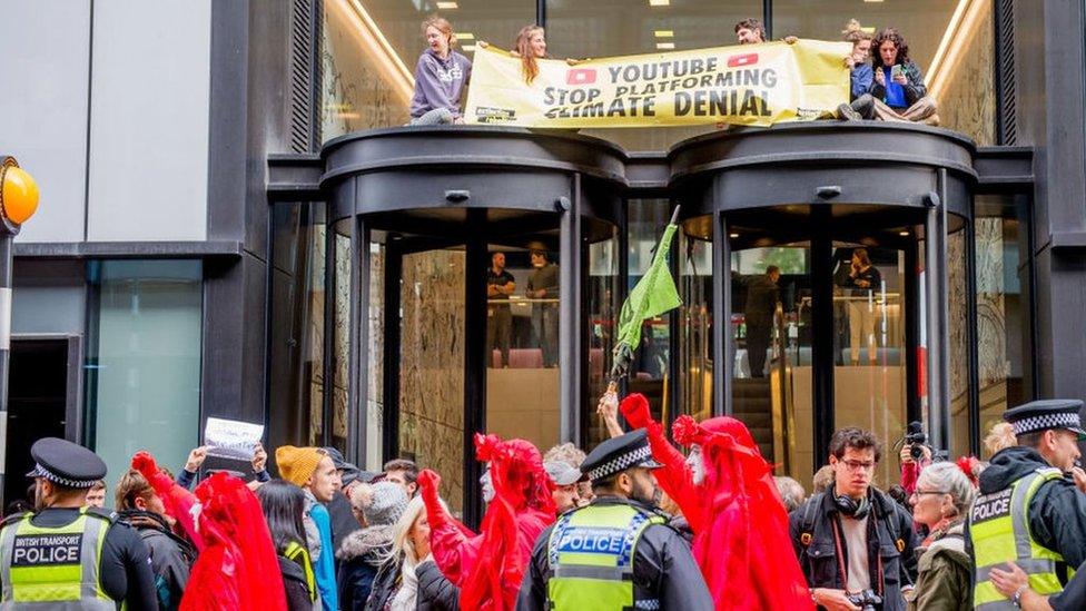 Extinction Rebellion on top of YouTube building