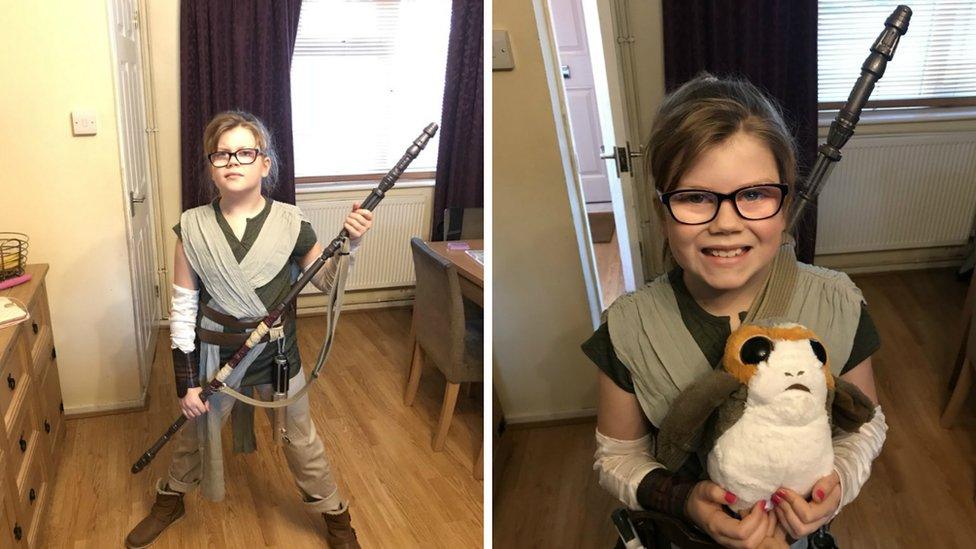 Young fan dressed as Rey from Star Wars