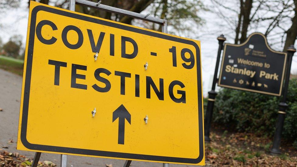 A sign saying Covid-19 testing