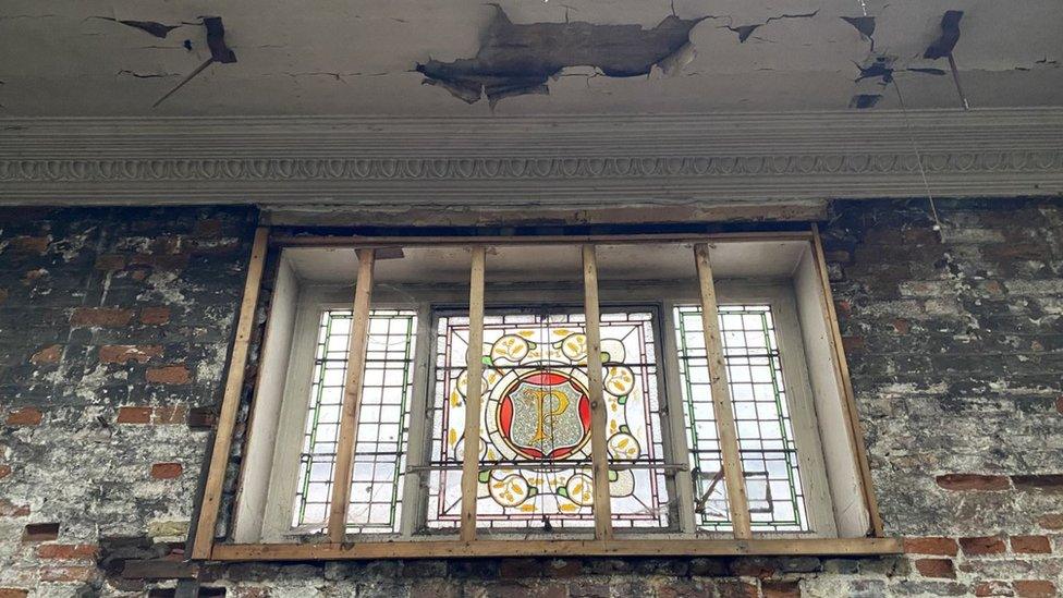 A stained glass window in the old Palmers building