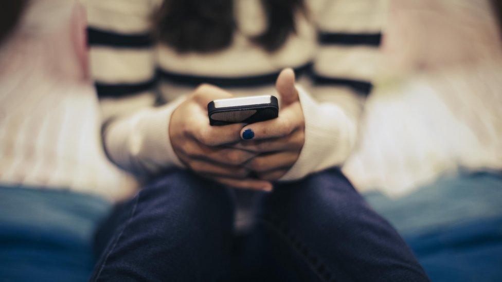 Girl using mobile phone