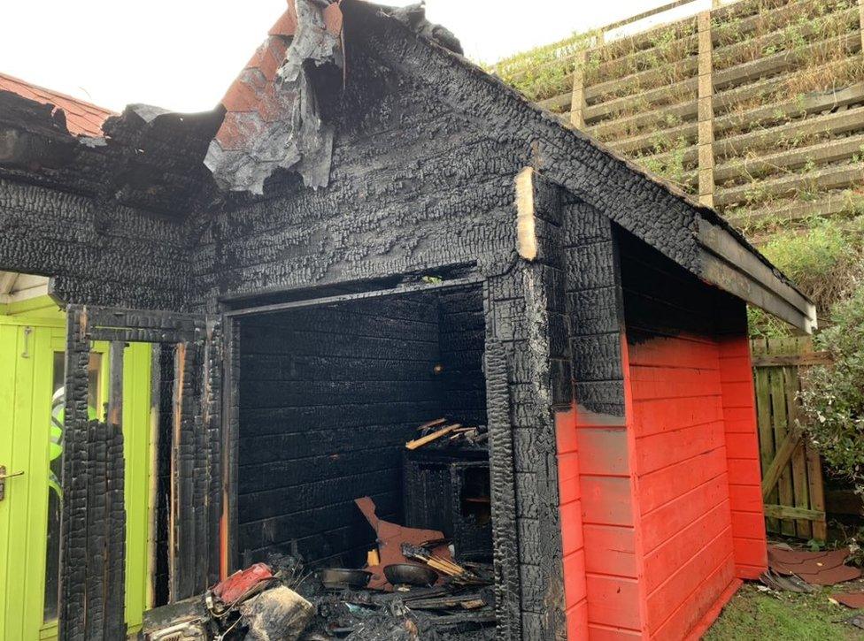 Burnt down beach hut