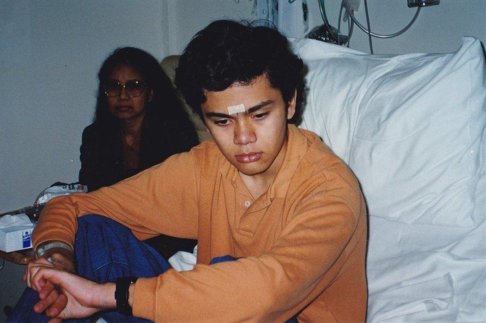 Martin Hopley as a boy, in hospital with his mother