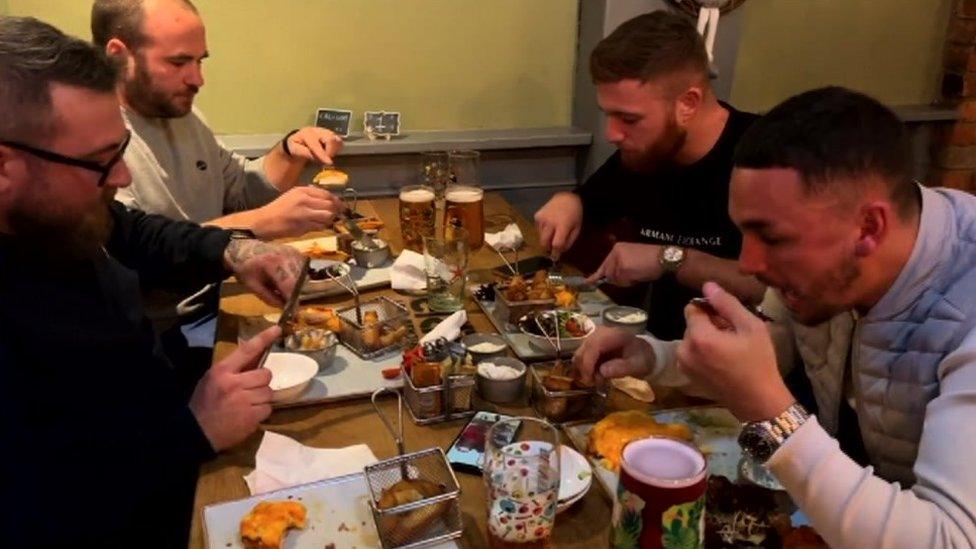 Pub-goers tuck into a Christmas meal