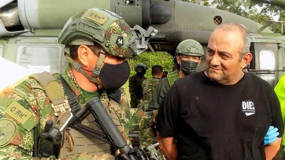 Dairo Antonio Usuga David, alias "Otoniel", top leader of the Gulf clan, is escorted by Colombian military after being captured, in Turbo, Colombia October 23, 2021