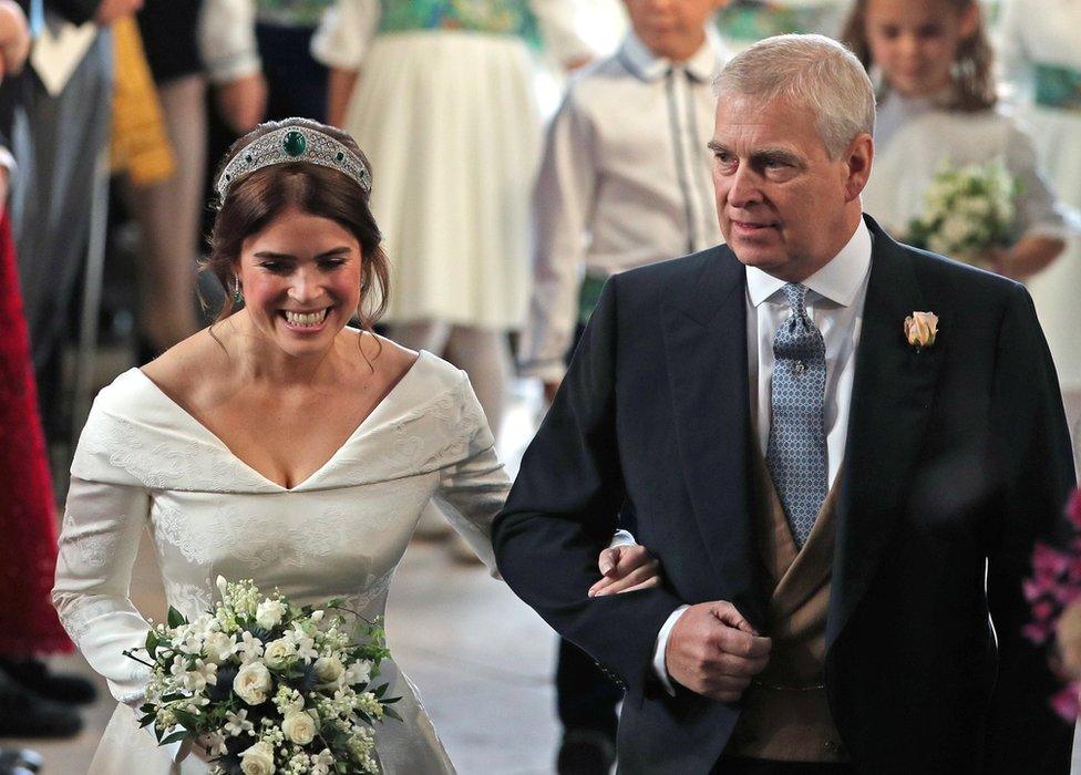 Princess Eugenie walks down the aisle with her father, the Duke of York, for her wedding to Jack Brooksbank at St George"s Chapel in Windsor Castle