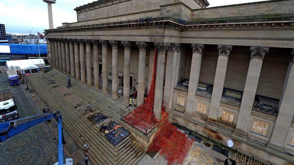 Poppies drape down St George's Hall