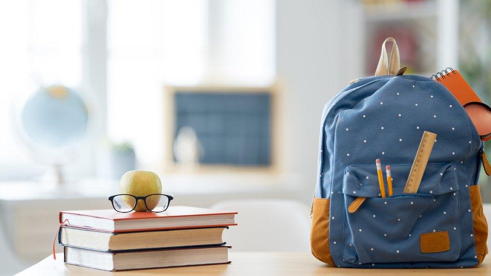 school-bag-on-desk-books.