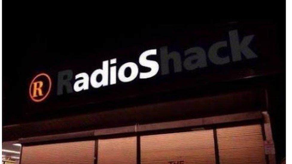 Radioshack sign photoshopped to read just adios