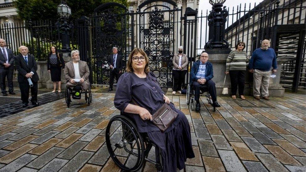 Jennifer McNern (centre) outside Belfast High Court On Monday