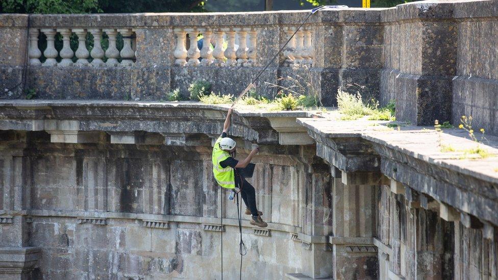 A stonemason working on the Dundas Aqueduct