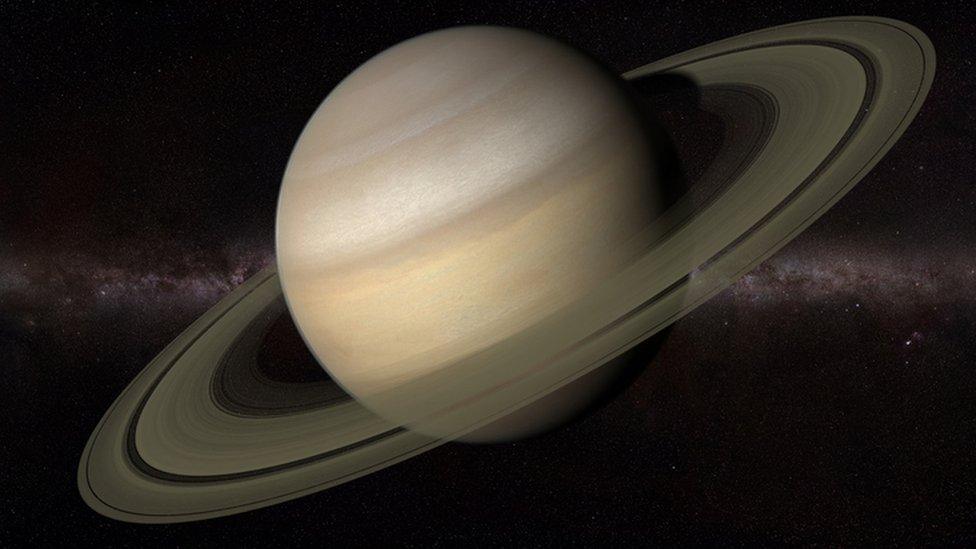 Zoomed in image of Saturn with stars in the background