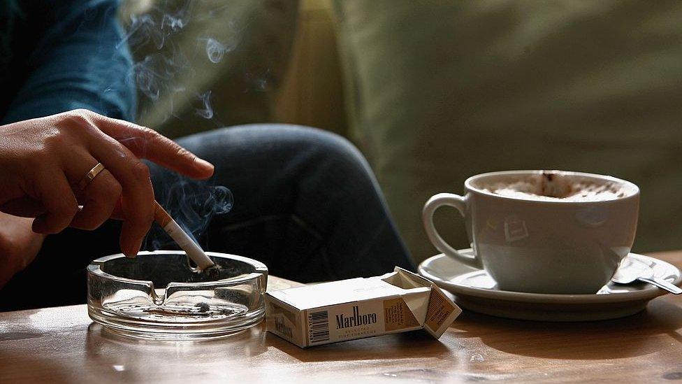 smoking in a cafe