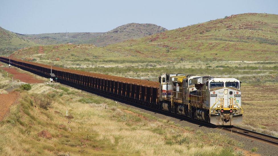 A train taking iron ore from the Pilbara region to the coast of Western Australia