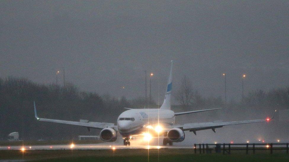 The plane carrying Syrian refugees lands at Glasgow airport