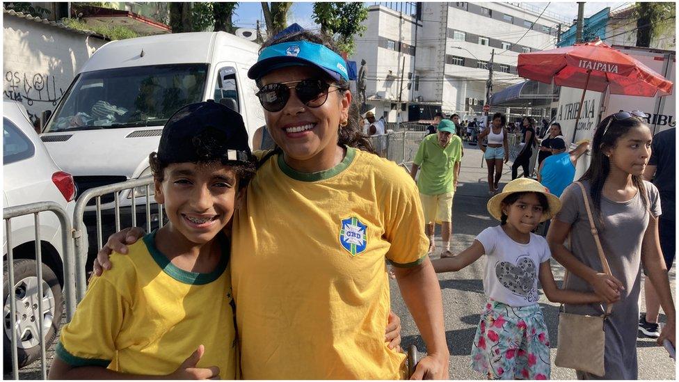 A woman and her son on the Streets of Santos