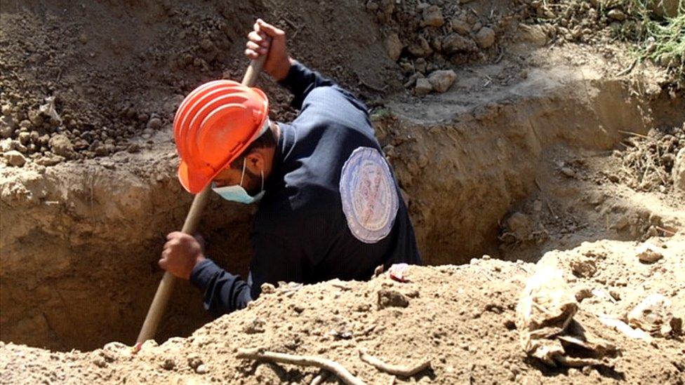 Man digs mass grave