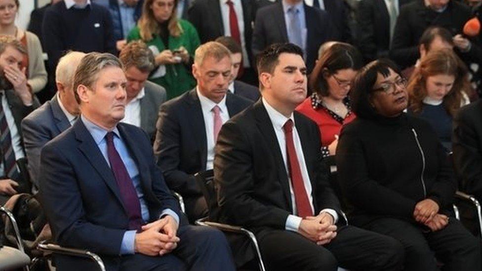 (L-R) Keir Starmer, Richard Burgon and Dianne Abbott listen as Labour leader Jeremy Corbyn makes a speech