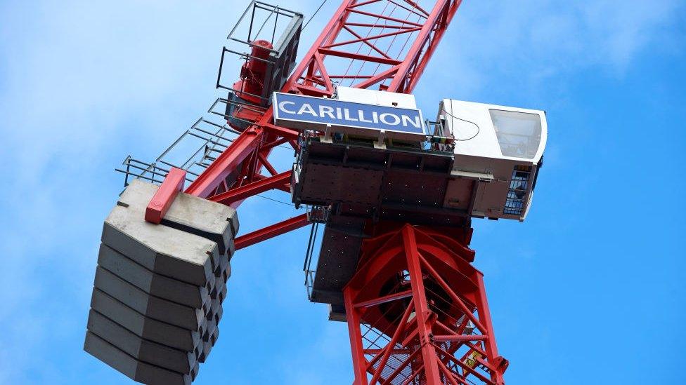 A crane bearing the Carillion logo