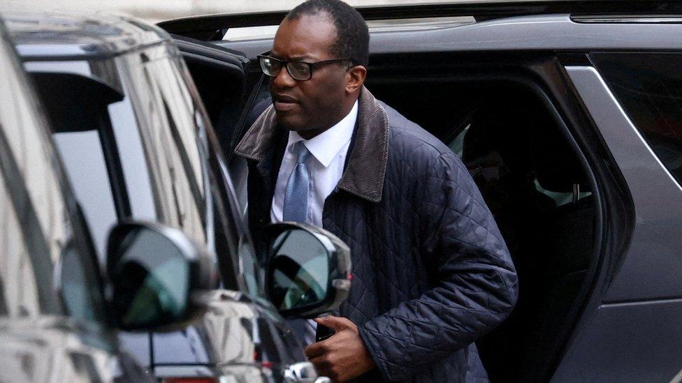 Chancellor of the Exchequer Kwasi Kwarteng exits a car on Downing Street