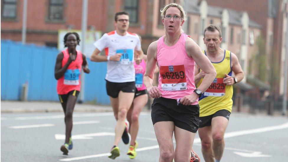 Five competitors running along part of the marathon route, Belfast City Marathon, 1 May 2017