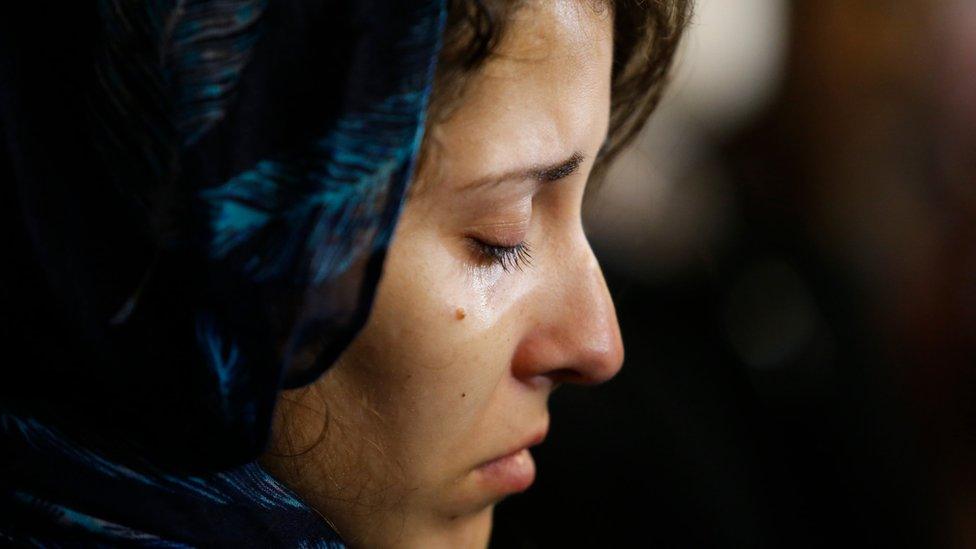 An orthodox believer mourns the late Serbian Patriarch Irinej in Belgrade, Serbia, 21 November 2020.