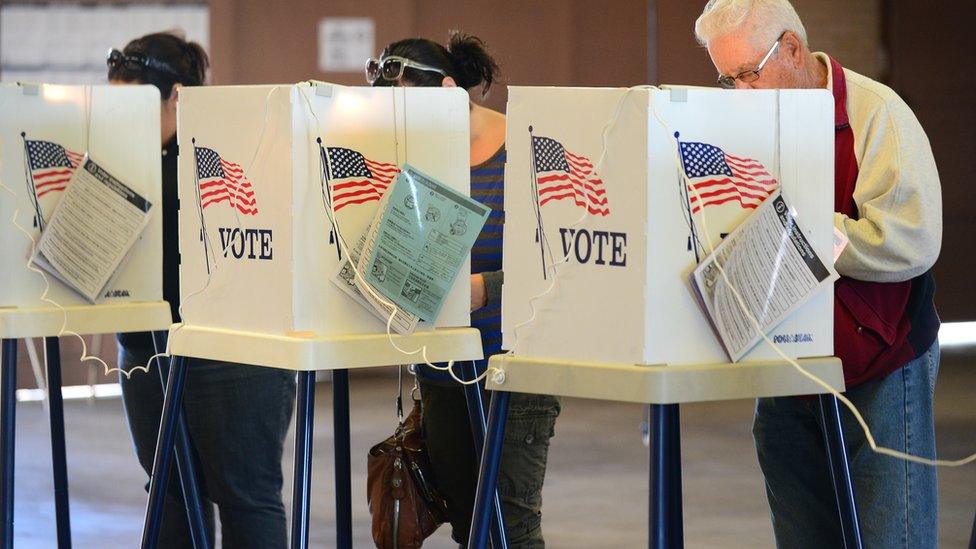 Alhambra residents vote on election day at the Alhambra Fire Station #71 in Alhambra, Los Angeles County, on November 6, 2012 in California.