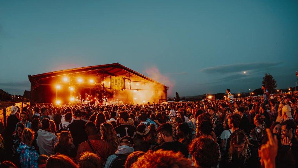 Barn on the Farm festival 2023 showing a crowd in front of a stage