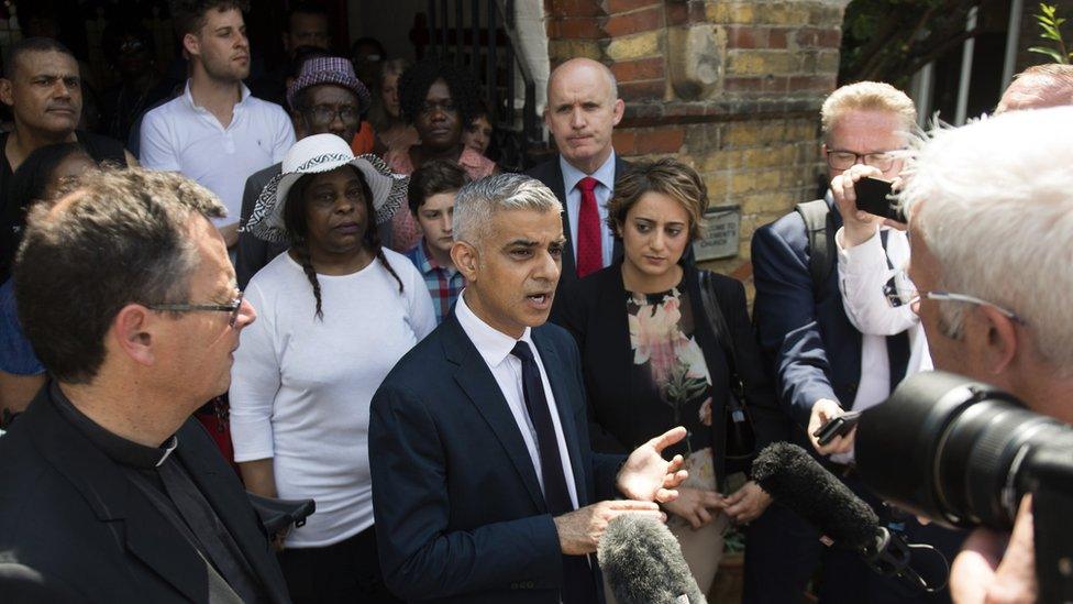 London Mayor Sadiq Khan addresses the media after a service at St Clements Church