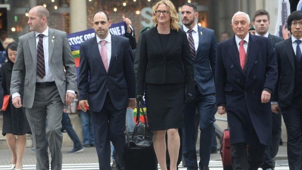 Claire Blackman (centre), Jonathan Goldberg QC (right, wearing red tie)