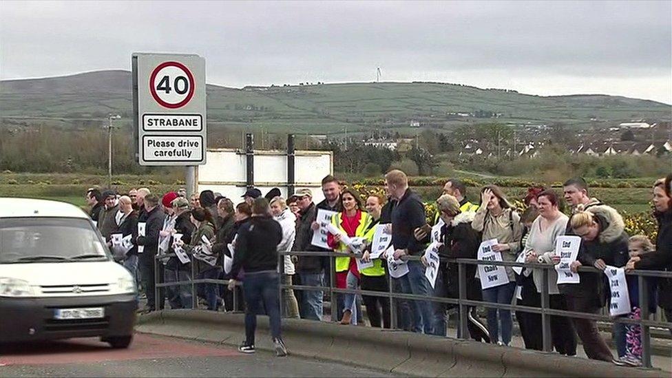 People protesting along the border at Strabane