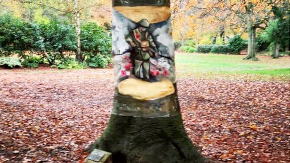 A soldier painted on a tree