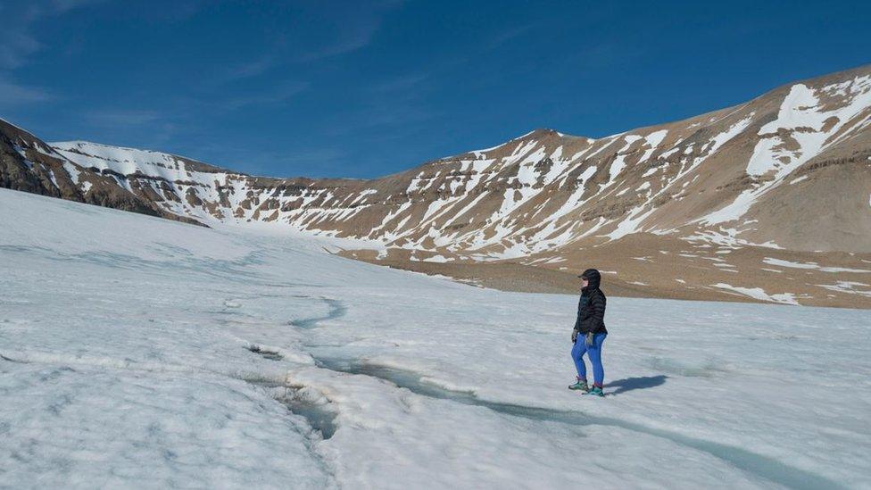 Emily Broadwell with fellow members of the Microlab team in snowy mountains