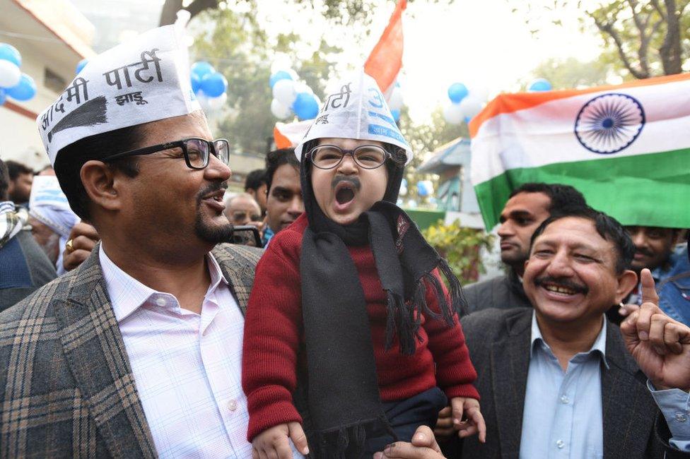 A child dressed up as AAP convener and Delhi Chief Minister Arvind Kejriwal during celebration at AAP headquarter, on February 11, 2020.