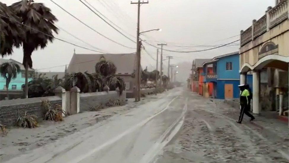 Ash covers roads a day after the La Soufriere volcano erupted after decades of inactivity, about 5 miles (8 km) away in Georgetown, St Vincent and the Grenadines April 10, 2021