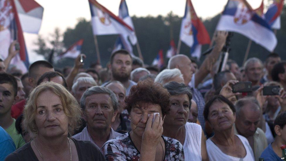 A woman cries as she attends an event to mark the 20th anniversary of Operation Storm in Raca, Serbia, Tuesday, 4 August 2015.