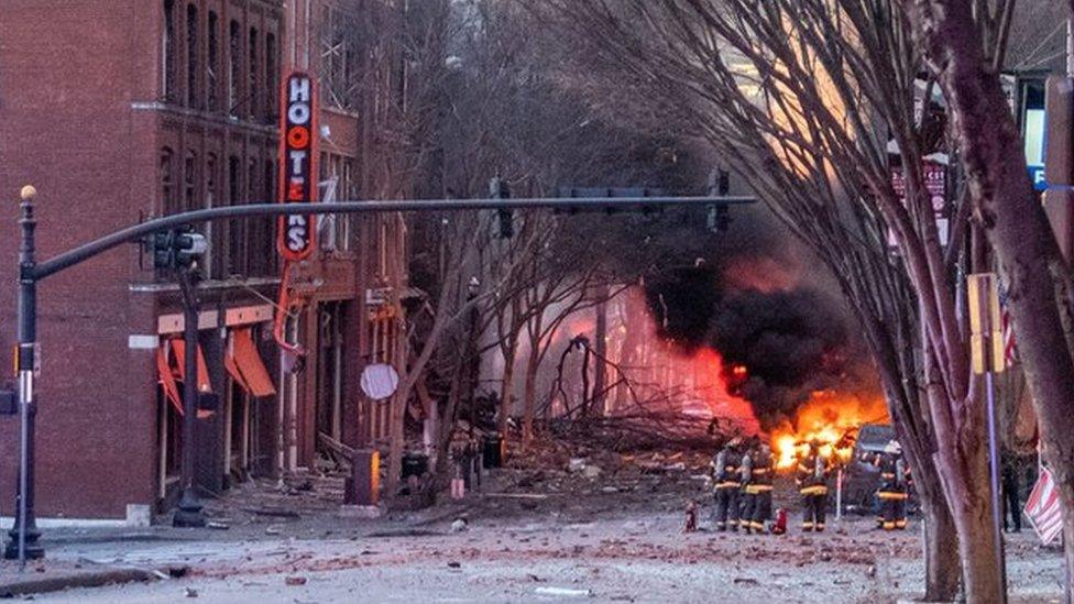 Debris litters the road near the site of an explosion in the area of Second and Commerce in Nashville