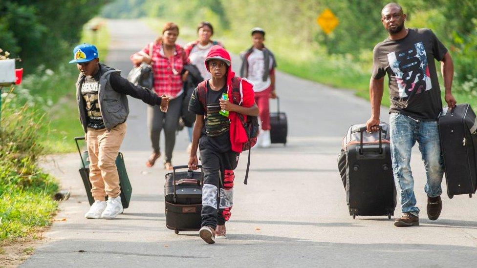 Refugees cross at Roxham Road in Quebec