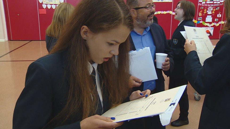 A teenager opens her results at a secondary in Airdrie