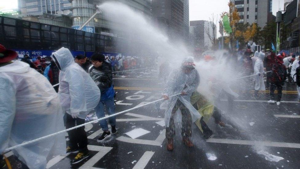 South Korean police uses water cannons against protesters in Seoul, 14 November 2015