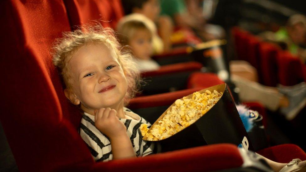 Child with popcorn